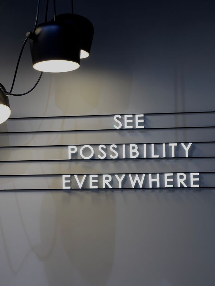 Mastering the First Impression: Your intriguing post title goes here Inspirational message on a stylish wall in a modern interior setting.